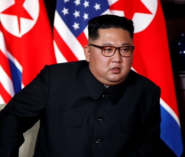 What Kim's suit, shoes and hairstyle tell us about him | iNFOnews.ca CP683828352