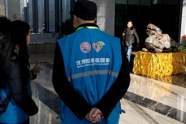Smokers chased in Beijing as China considers national law | iNFOnews.ca Smokers chased in Beijing as China considers national law | iNFOnews.ca