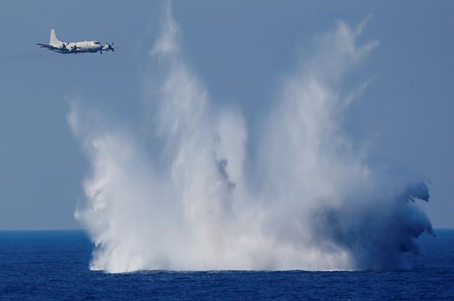 Japan OKs divisive plan to send naval troops to Mideast | iNFOnews.ca