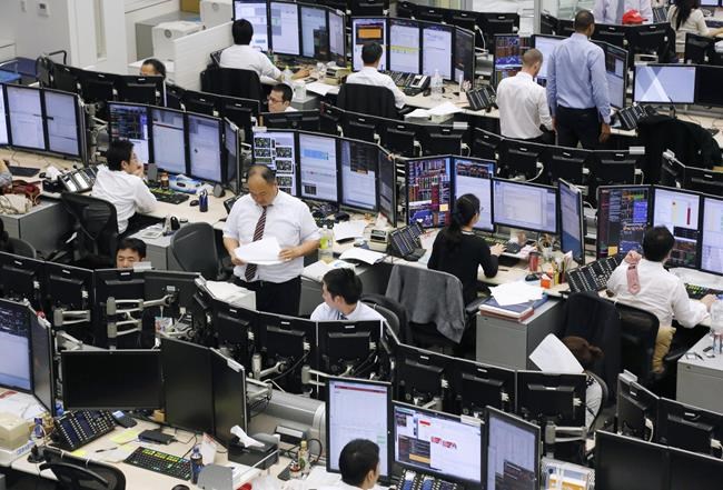 Global stock markets mostly higher after Wall Street loss | iNFOnews.ca CP386819927