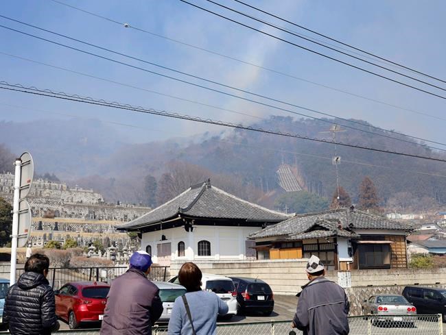 Helicopters, firefighters battle 2 forest fires in Japan | iNFOnews.ca