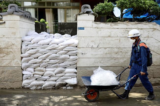 Tropical storm hits Japan, heads for hard-hit western region | iNFOnews.ca CP240894292