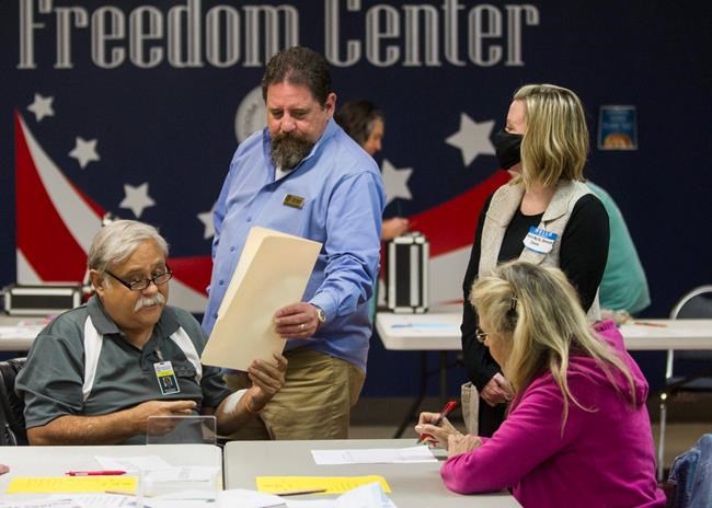 Masked workers start presidential hand tally in Georgia | iNFOnews.ca