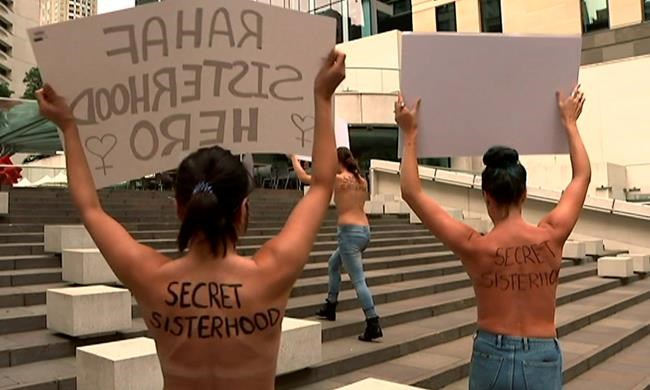 Australians hold topless protest in support of Saudi runaway | iNFOnews.ca