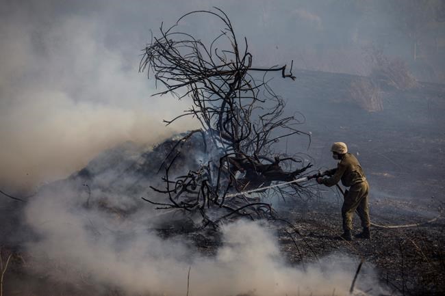 Israel restricts power to Gaza after balloons spark fires | iNFOnews.ca