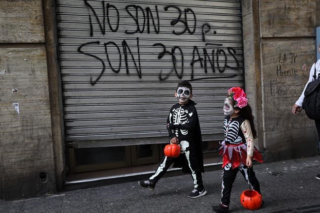 Thousands march in Chile protest after summit cancellations | iNFOnews.ca