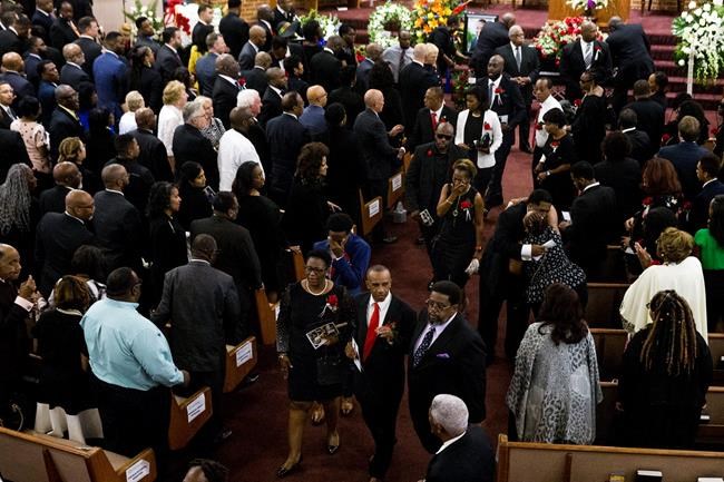 The Latest: Downtown march protests man's police shooting | iNFOnews.ca