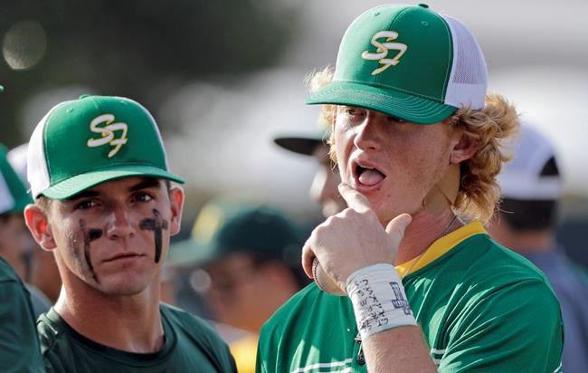 The Latest: Wounded student attends school baseball game | iNFOnews.ca The Latest: Wounded student attends school baseball game | iNFOnews.ca