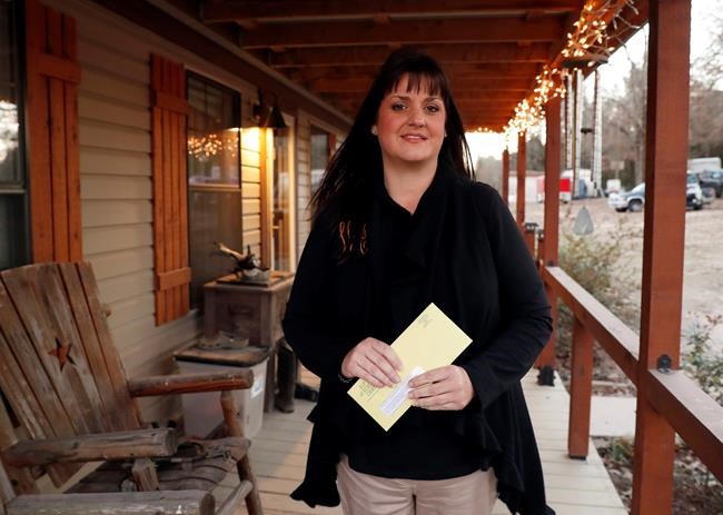 Secret Santas: Charity buys and erases past-due medical debt | iNFOnews.ca CP1989080119