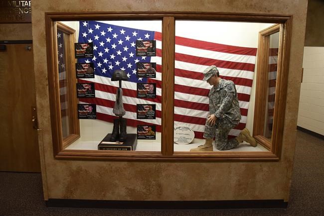 The Latest: Funeral plans are pending for Utah Guard major | iNFOnews.ca CP614383648