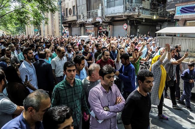 Protests in Iran as Rouhani says US wants 'economic war' | iNFOnews.ca CP464160053