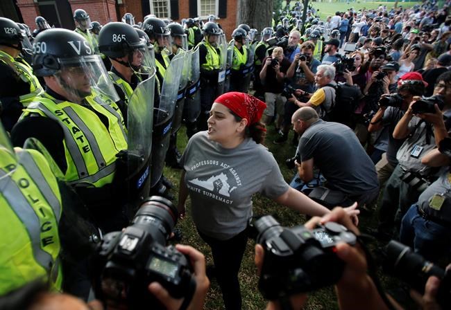 Tense confrontation amid peaceful vigils in Charlottesville | iNFOnews.ca Tense confrontation amid peaceful vigils in Charlottesville | iNFOnews.ca