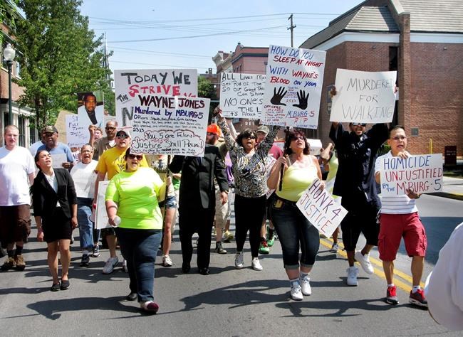 Family of Black man shot 22 times by police settles lawsuit | iNFOnews.ca CP518733815