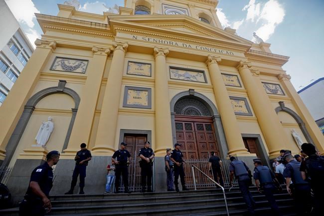 Memorial for cathedral victims, death toll rises to 5 | iNFOnews.ca CP360644498