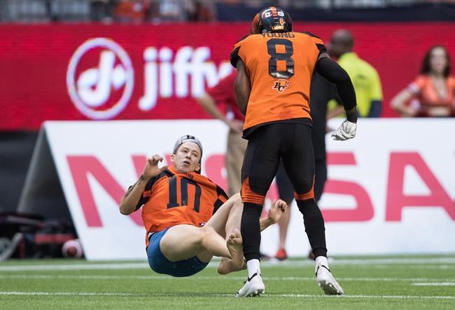 Lions defensive back Marcell Young levels streaker in home opener | iNFOnews.ca CP795211544