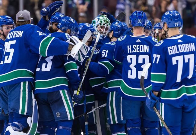 Goaltender Thatcher Demko keeps smiling in nail-biting NHL debut, Canucks win | iNFOnews.ca
