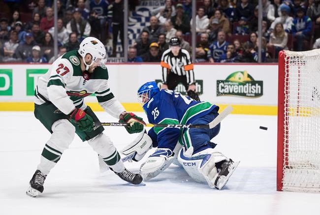 Wild beat Canucks 4-3, Canucks tie for second place in Pacific Division | iNFOnews.ca CP2045201476