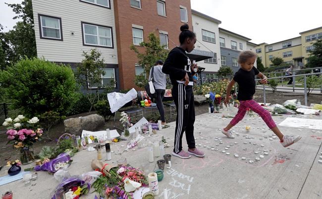 The Latest: Hundreds honour Charleena Lyles, shot by police | iNFOnews.ca CP964653544
