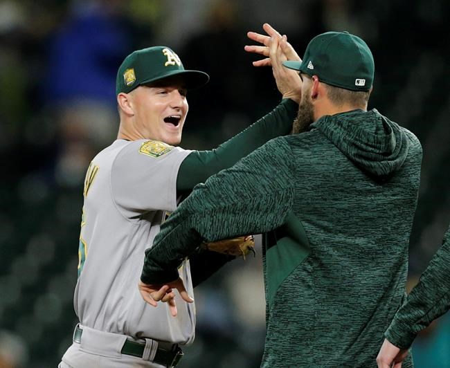 Athletics clinch playoff berth with Rays' loss to Yankees | iNFOnews.ca CP996428804