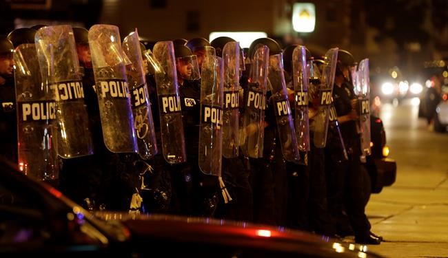 The Latest: Police Chief: Some arrests made but city calm | iNFOnews.ca CP95212461