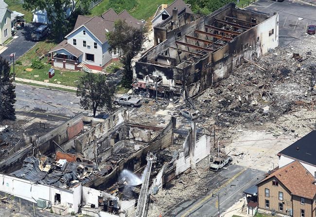 Firefighter killed in gas explosion, fire near Madison | iNFOnews.ca CP512793743