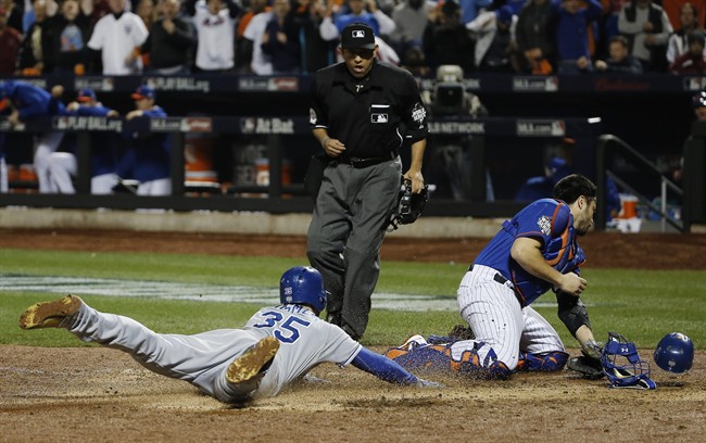 Crown 'em! Royals win first World Series title since 1985; rally in 9th, beat Mets 7-2 in 12 | iNFOnews.ca CP35167081