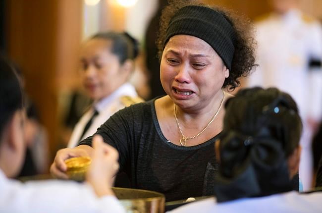 In wake of Thai king's death, grief is black and white | iNFOnews.ca CP780344590