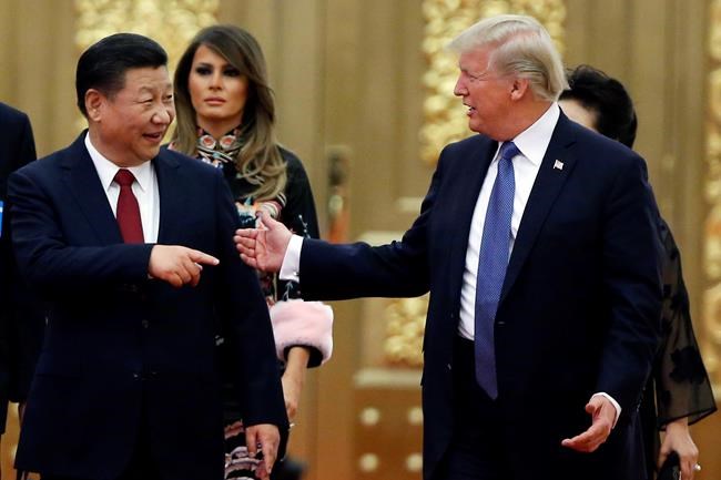 The Latest: China fires back at US, raises own tariffs | iNFOnews.ca