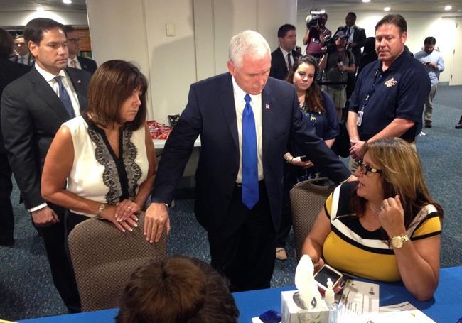 Pence meets with Puerto Ricans recovering from hurricane | iNFOnews.ca CP898457776