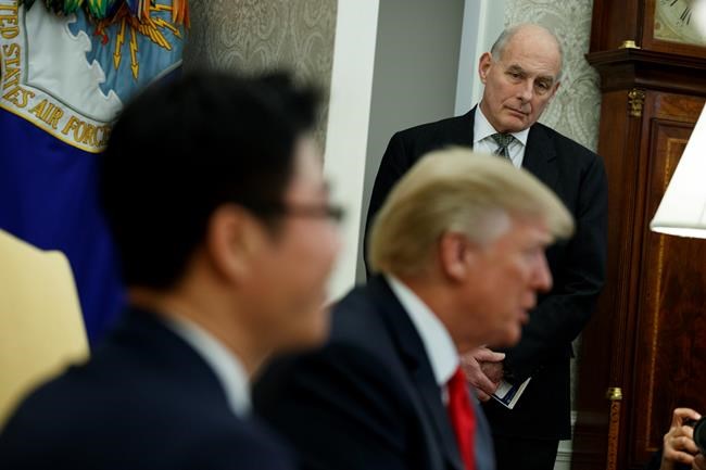 Amid a White House in tumult, Trump defends former aide | iNFOnews.ca