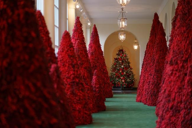 Melania Trump's red topiary trees a hit at Christmas parties | iNFOnews.ca