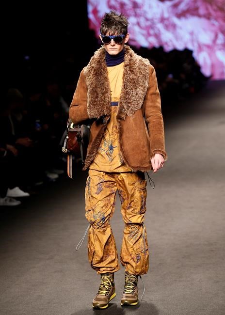 Impish, boyish looks permeate Milan's menswear runways | iNFOnews.ca