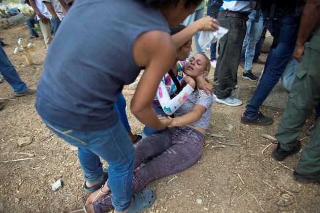 Venezuelan jail dead buried in mass tomb as questions linger | iNFOnews.ca Venezuelan jail dead buried in mass tomb as questions linger | iNFOnews.ca