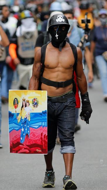 Venezuela's 'painter of protests' sees art on the barricades | iNFOnews.ca