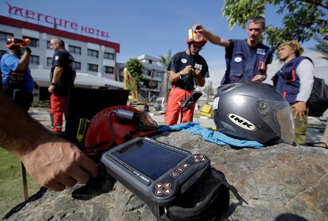 No signs of life in hotel rubble, week after Indonesia quake | iNFOnews.ca