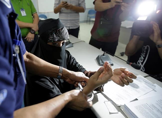 Officials: Arrested Filipina also faces terror raps in India | iNFOnews.ca