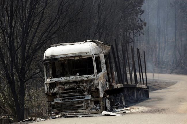 The Latest: Portugal raises death toll back to 62 | iNFOnews.ca CP954535801