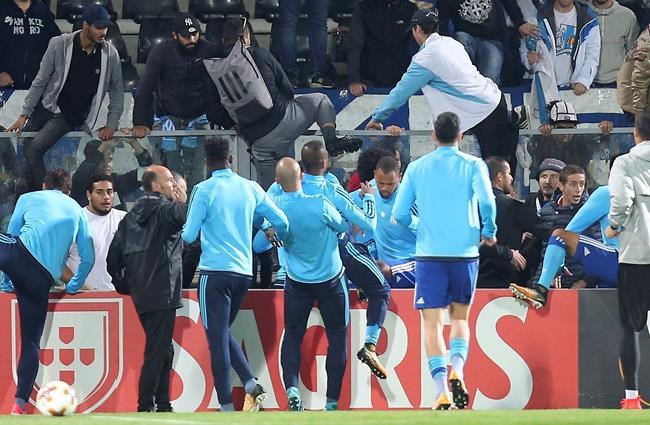 Evra fired by Marseille, banned by UEFA for kicking fan | iNFOnews.ca Evra fired by Marseille, banned by UEFA for kicking fan | iNFOnews.ca