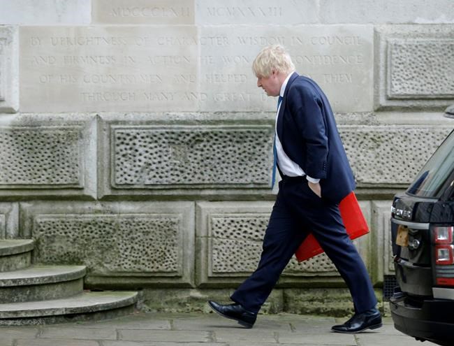 UK's Northern Ireland minister quits as May shuffles Cabinet | iNFOnews.ca