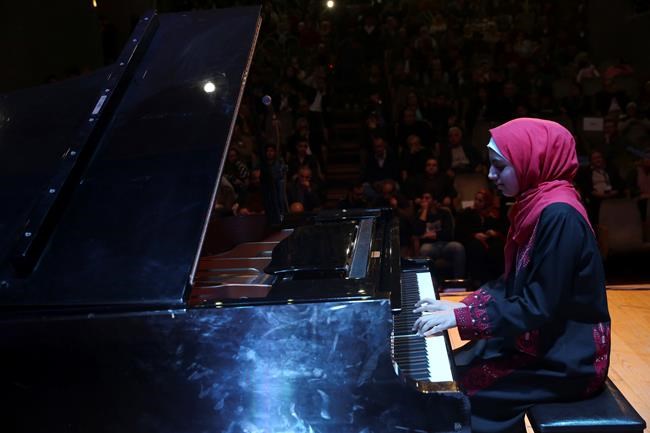 After rescue, Gaza's only grand piano makes public comeback | iNFOnews.ca