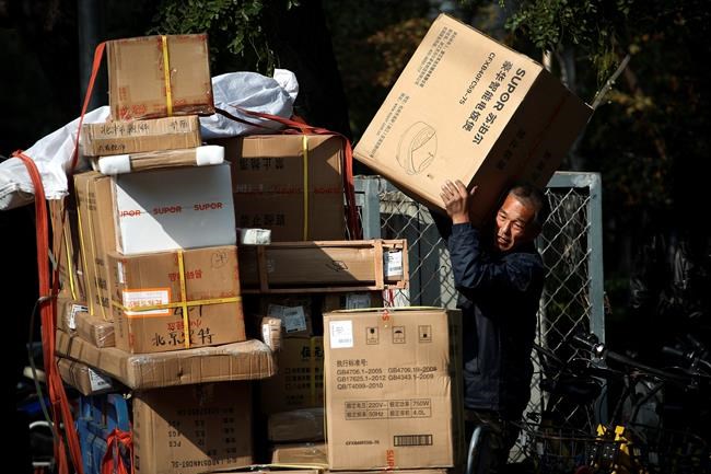 China's growth slows as officials try to reassure investors | iNFOnews.ca CP35607198