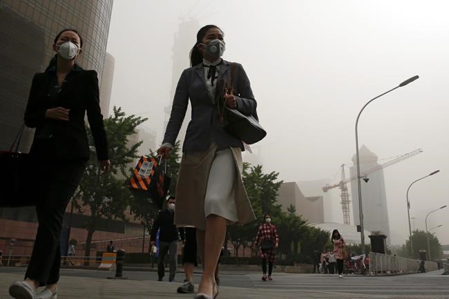 Sandstorm blankets huge area of China in dusty pollution | iNFOnews.ca Sandstorm blankets huge area of China in dusty pollution | iNFOnews.ca