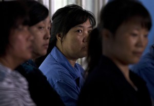 US boss held hostage by Chinese employees departs plant after agreeing to pay workers | iNFOnews.ca CP23999436