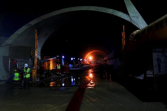 3 bodies found in China tunnel collapse, 11 still missing | iNFOnews.ca