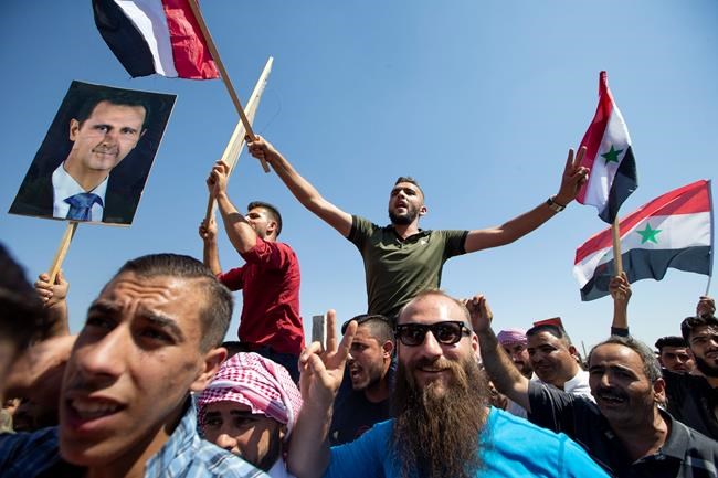 Former rebel stronghold in Syria begins to rebuild | iNFOnews.ca