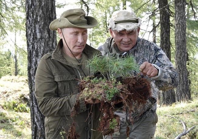 Putin keeps his shirt on, hikes in Siberia to relax | iNFOnews.ca Putin keeps his shirt on, hikes in Siberia to relax | iNFOnews.ca