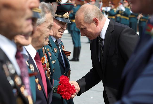 Putin unveils monument to fallen Red Army WWII soldiers | iNFOnews.ca Putin unveils monument to fallen Red Army WWII soldiers | iNFOnews.ca