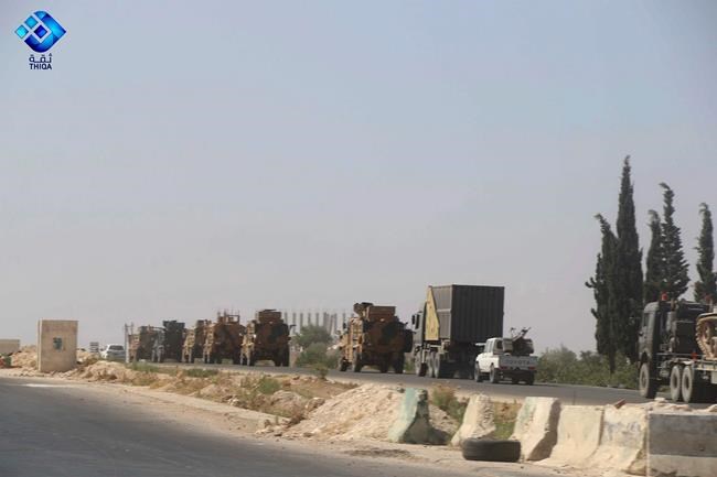 The Latest: Turkey says its army convoy targeted in Syria | iNFOnews.ca