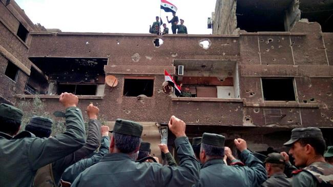 Syrian army, police celebrate recapturing all of Damascus | iNFOnews.ca