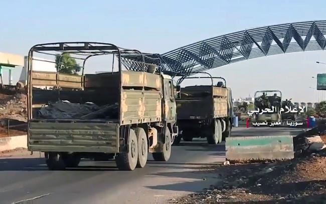 Syrian troops celebrate recapture of Jordan border crossing | iNFOnews.ca